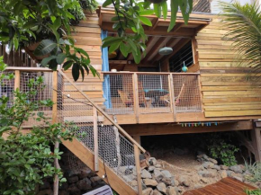 Bungalow écologique avec toilettes sèches LEU KABANON vue mer
